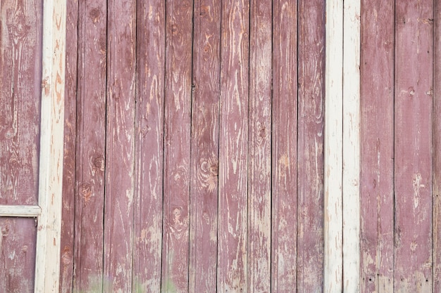 Background of wooden red old fence texture