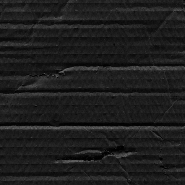 Background of wrinkled black cardboard