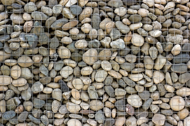 Backgrounds collection - The decorative stone wall built of sea pebbles