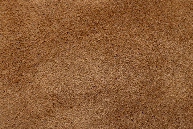 Backgrounds and textures of brown natural suede, studio shot.