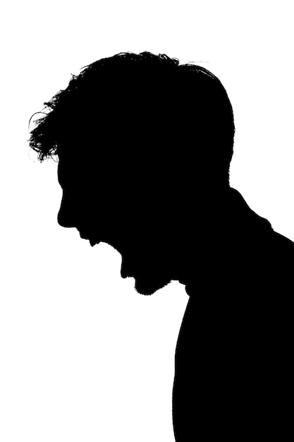 Foto retroilluminazione ritratto silhouette arrabbiato urlando giovane di profilo