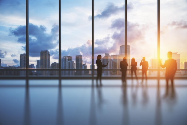 Backlit crowd of businesspeople working together in bright office interior with sunlight and city view with clouds Teamwork and corporate workplace concept Double exposure