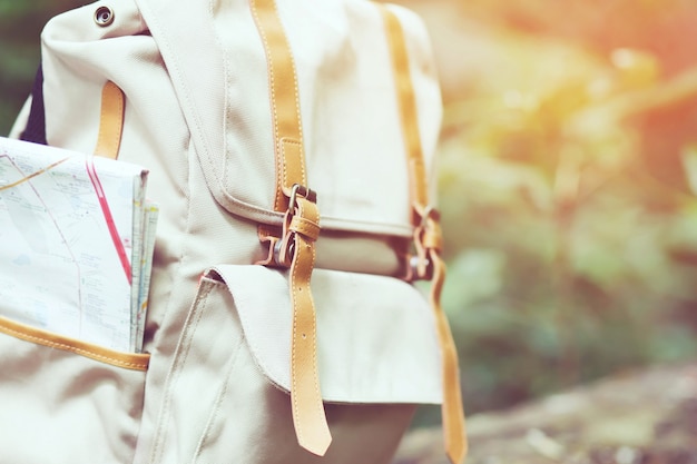 Backpack and hiking in forest