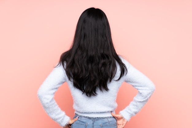 Backview of a woman in studio