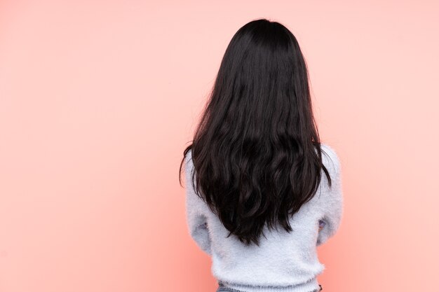 Backview of a woman in studio