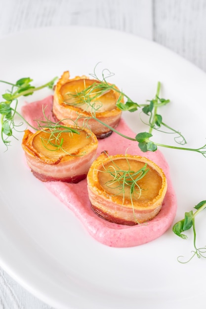 Foto scallop di bacon eryngii