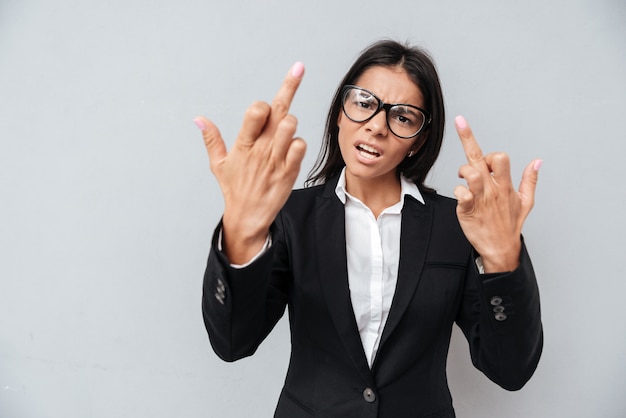 Bad Business woman showing middle fingers