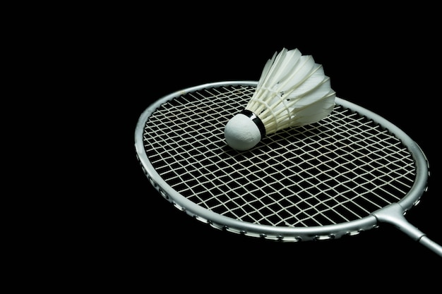 Photo badminton ball on black background