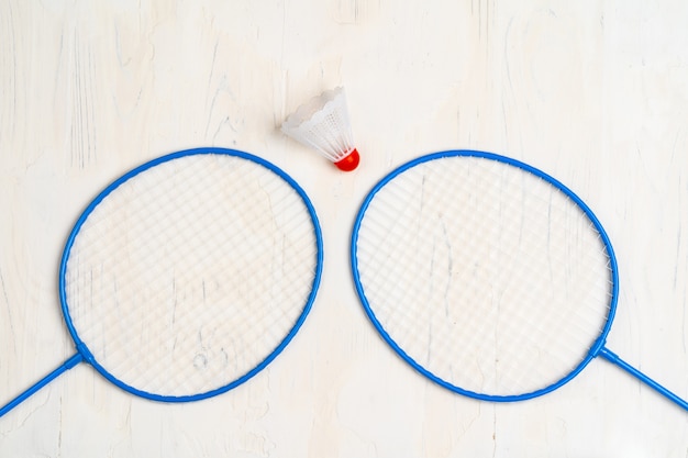 Badminton equipment. Rackets and shuttlecock, top view