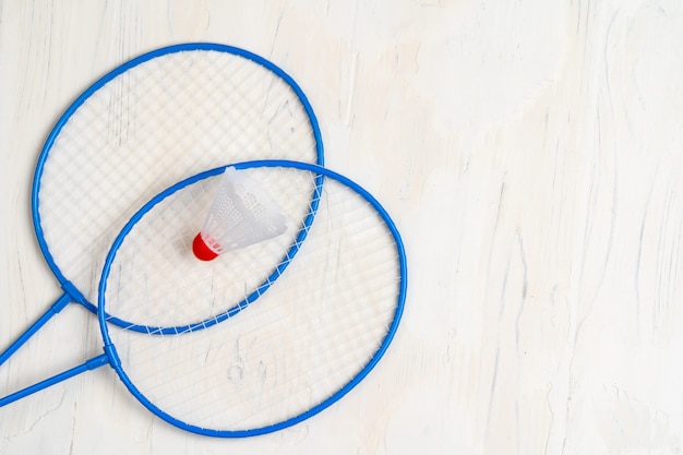 Badminton equipment. Rackets and shuttlecock, top view