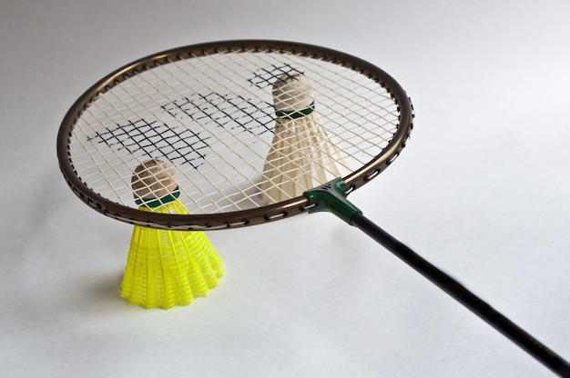 Badminton racket shuttlecock on a white background