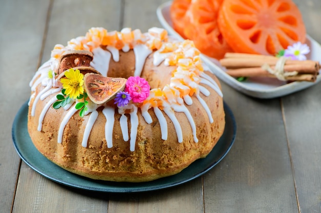 Bael Fruit Cake decorated with small flowers on top sweet and healthy dessert