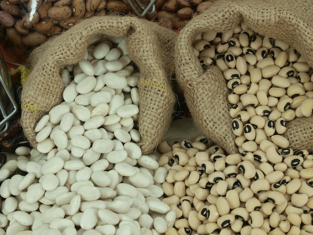 A bag of beans is shown next to a bag of beans.