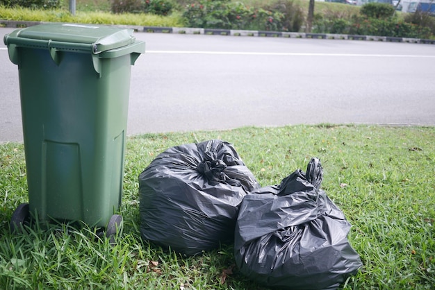 Photo bag with garbage and rubbish bin