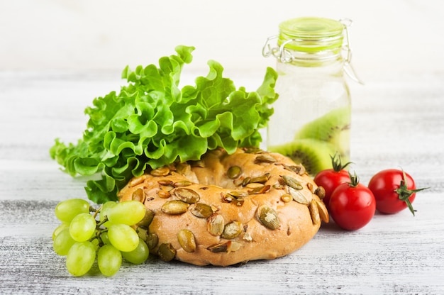 Bagel and salad, tomato, grape