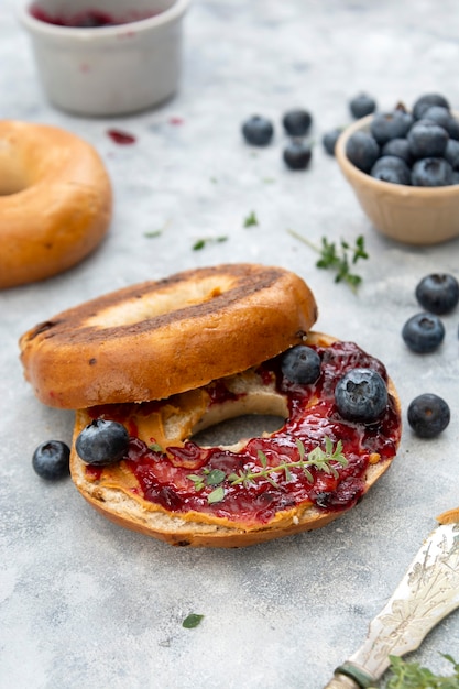 Bagels with cinnamon and blueberry, top view. Pastry food.