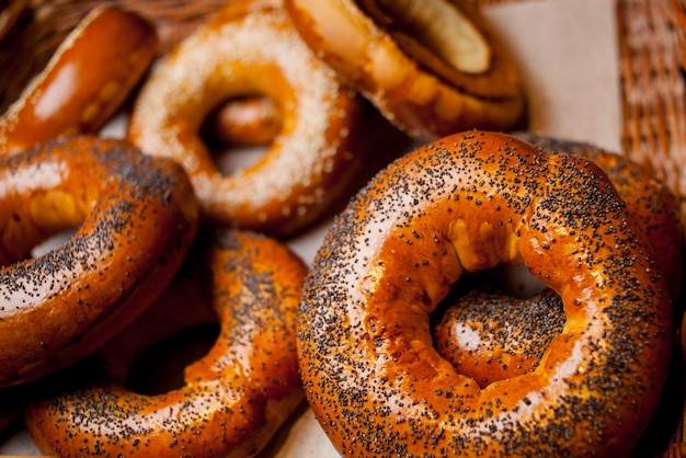 Bagels with sesame and poppy seeds Fresh bagel with poppy seed on sackcloth