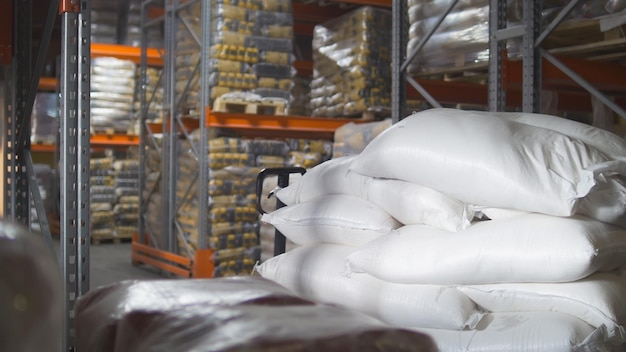 A bags with sugar inside a large industrial warehouse