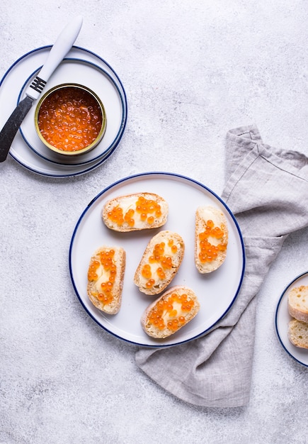 Baguette bread with red caviar