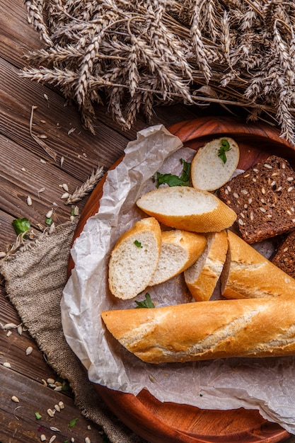 Baguette, fresh bread in bowl