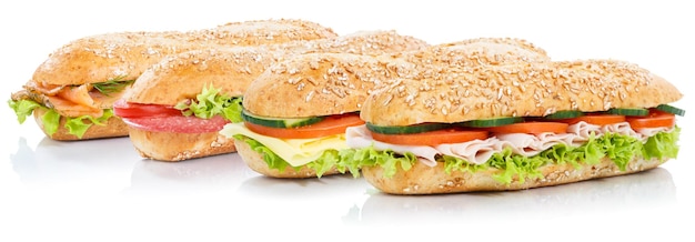 Baguette sub sandwiches with salami ham cheese salmon fish whole grains fresh isolated on white