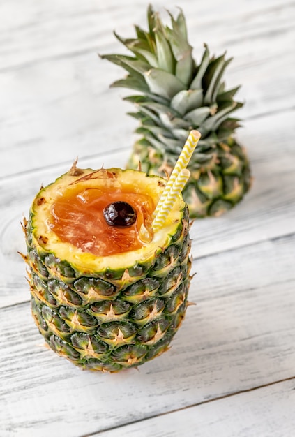 Bahama Mama Cocktail served in hollowed out fresh pineapple