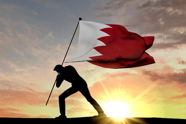 Bahrain flag being pushed into the ground by a male silhouette 3D Rendering