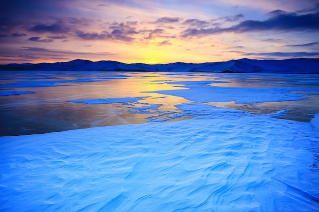 Baikal ice landscape, winter season, transparent ice with cracks on the lake