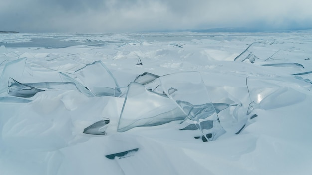 The Baikal ice with cracks Closeup view Concept Global warming melting ice