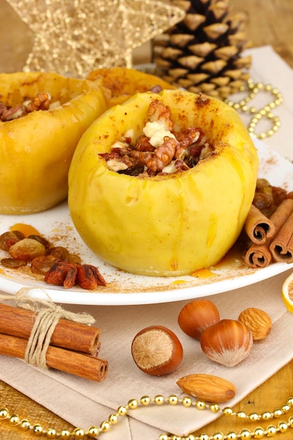 Baked apples on plate close up