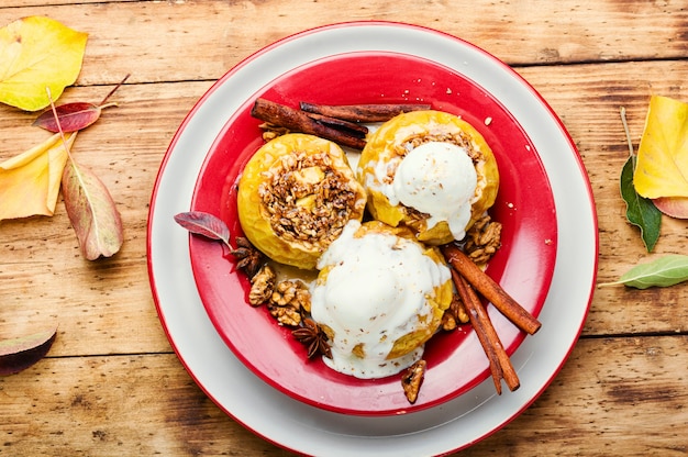 Baked apples stuffed with granola and nuts.Baking concept