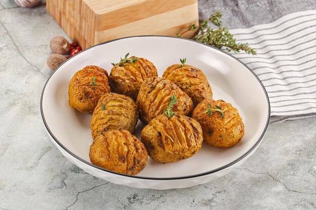 Baked baby potato with thyme