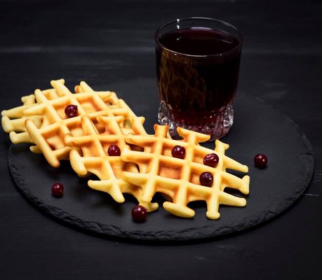 Baked Belgian waffles and fruit compote 