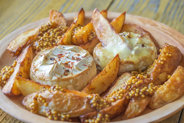 Baked Camembert cheese with potato