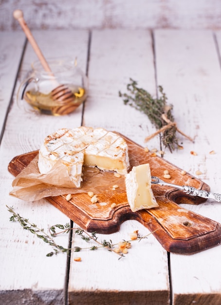 Baked Camembert with honey, pine nuts 