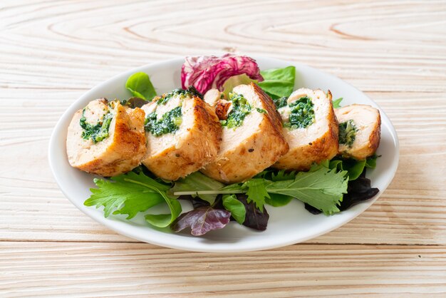 Baked chicken breast stuffed with cheese and spinach