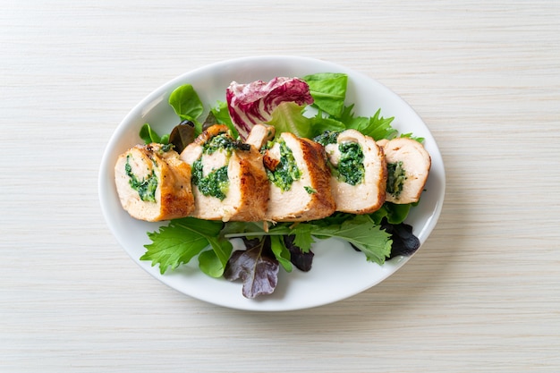 Baked chicken breast stuffed with cheese and spinach