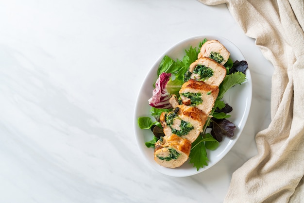 Baked chicken breast stuffed with cheese and spinach