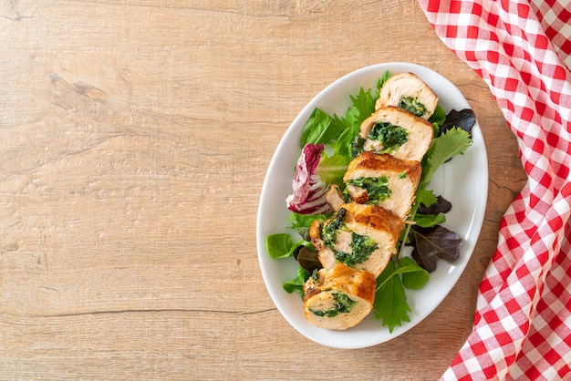 Baked chicken breast stuffed with cheese and spinach