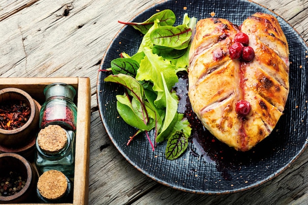 baked chicken meat in cherry sauce for the meat.healthy food