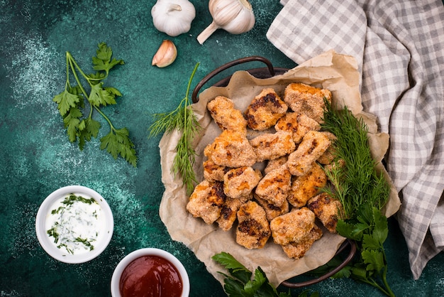 Baked chicken nuggets with sauces