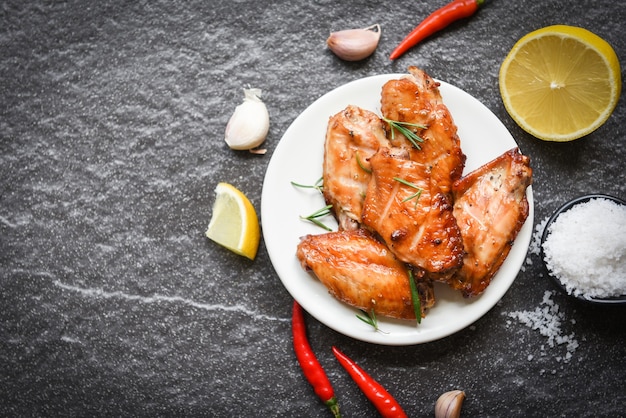 Baked chicken wings with sauce herbs and spices cooking thai asian food rosemary chicken grilled