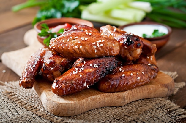 Photo baked chicken wings with teriyaki sauce