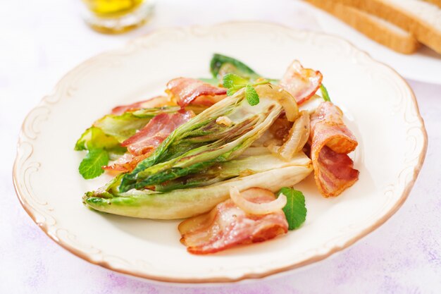 Baked chicory with bacon, onions and herbs.