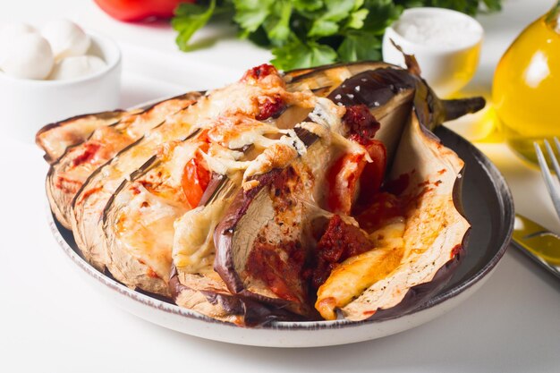 Baked cooked grilled eggplant with mozzarella cheese tomatoes Georgian cuisine