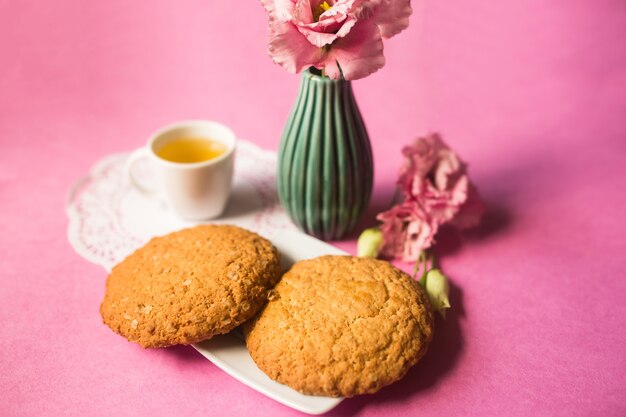 Baked cookies sugar cake on pink background