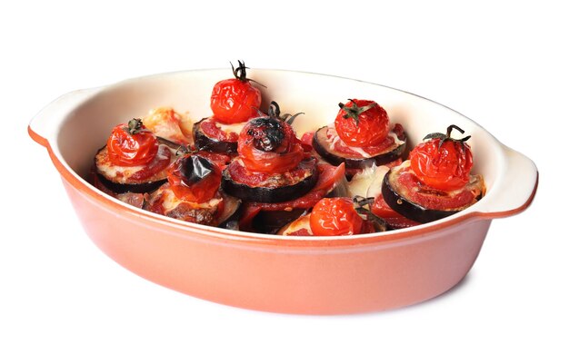 Baked eggplant with tomatoes and cheese in dishware isolated on white