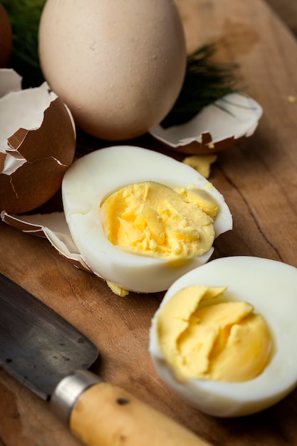 Baked eggs on wooden background