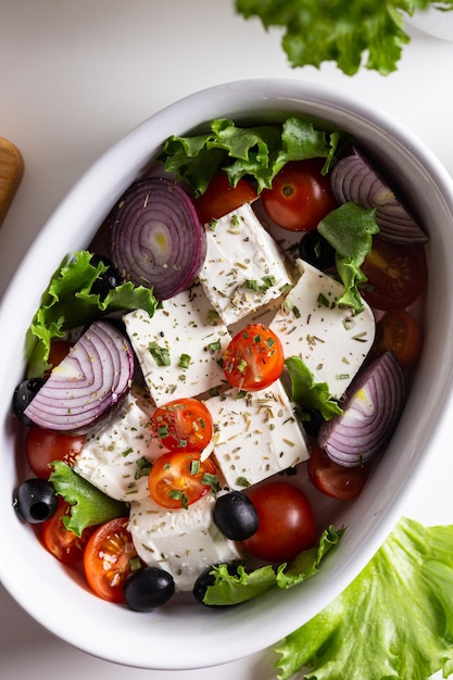 Baked feta cheese with vegetables