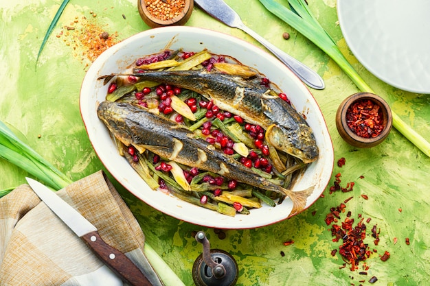 Baked fish with pomegranate